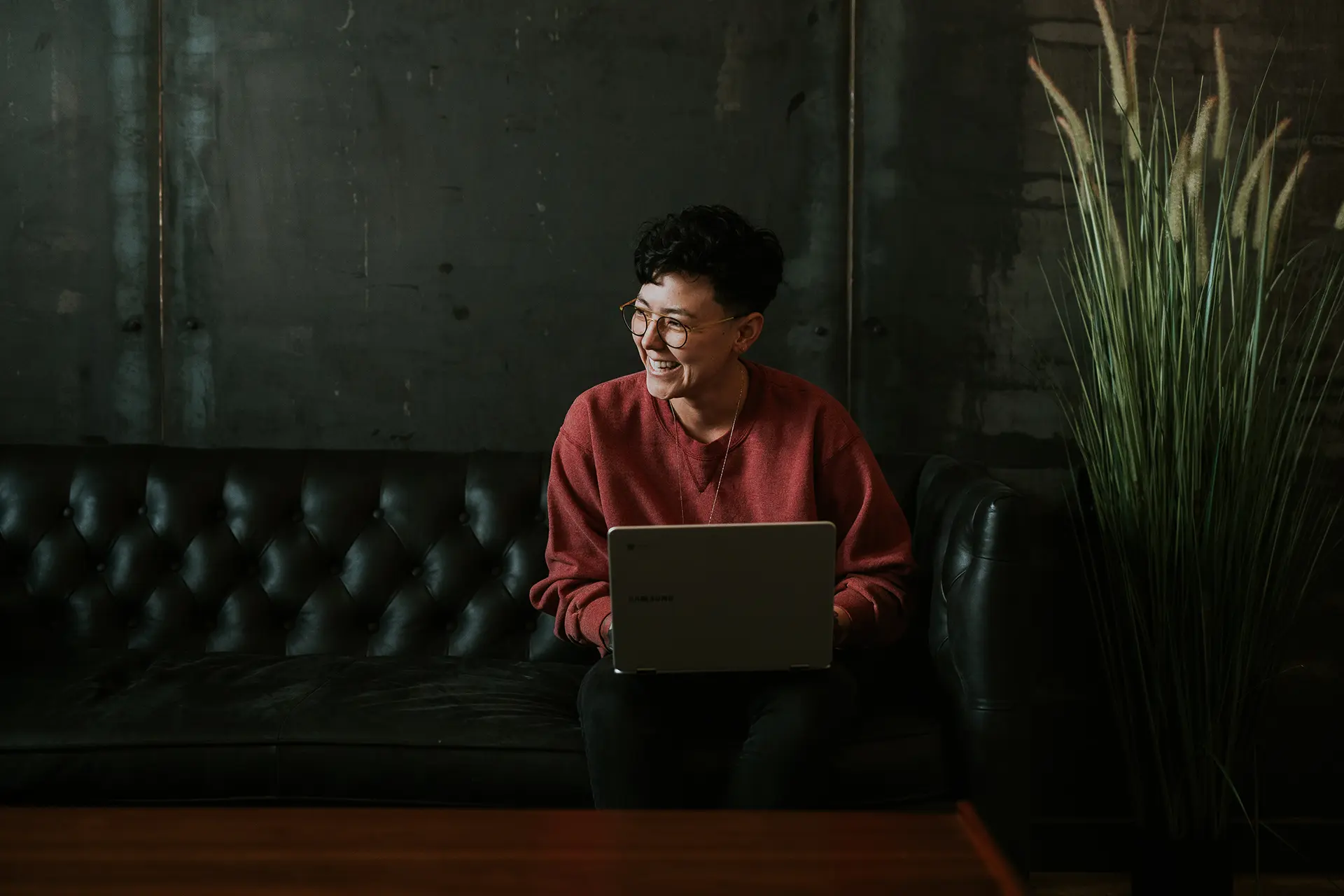 Smiling Woman Writer at Her Desk